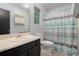 Bathroom with shower/tub combo and vanity at 430 Pilgrim Ln, Powder Springs, GA 30127