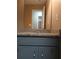Close up of bathroom vanity featuring granite countertops at 5517 Rock Shoals Way, Atlanta, GA 30349