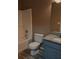Full bathroom with shower/tub combo with granite vanity and toilet at 5517 Rock Shoals Way, Atlanta, GA 30349