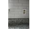 Close-up of granite countertops and white subway tile backsplash in the kitchen at 5517 Rock Shoals Way, Atlanta, GA 30349