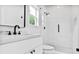 Modern bathroom with a walk-in shower, sleek fixtures, and a white vanity at 73 Whitefoord Se Ave, Atlanta, GA 30317