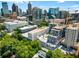 Aerial view of the property and surrounding neighborhood featuring ongoing construction at 1421 Peachtree Ne St # 203, Atlanta, GA 30309