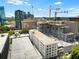 Aerial view of the property and surrounding area, with ongoing construction at 1421 Peachtree Ne St # 203, Atlanta, GA 30309