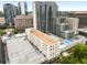 Amazing aerial view of building with a pool and city views, in a vibrant urban neighborhood at 1421 Peachtree Ne St # 203, Atlanta, GA 30309