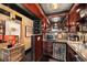 Cozy bar area with modern appliances and granite countertops near the entryway at 1421 Peachtree Ne St # 203, Atlanta, GA 30309
