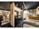 Chic bedroom featuring a black ceiling, mirrored column, and a four-poster bed for a modern and luxurious look at 1421 Peachtree Ne St # 203, Atlanta, GA 30309
