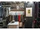 Large walk-in closet with ample storage, shelving and clothes at 1421 Peachtree Ne St # 203, Atlanta, GA 30309