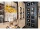 Hallway view featuring artwork, a black interior door, and decorative furnishings at 1421 Peachtree Ne St # 203, Atlanta, GA 30309