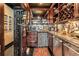 Kitchenette features granite counters, wood cabinetry, and stainless appliances at 1421 Peachtree Ne St # 203, Atlanta, GA 30309