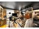 Living room with seating, decorative accents and sleek dark ceiling at 1421 Peachtree Ne St # 203, Atlanta, GA 30309