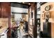 View of living room with dark wood trim and a sitting area at 1421 Peachtree Ne St # 203, Atlanta, GA 30309