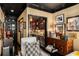Stylish living room featuring classic furniture, unique decor, and a view of the bar area at 1421 Peachtree Ne St # 203, Atlanta, GA 30309