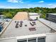 Spacious rooftop terrace featuring outdoor seating arrangements and picnic tables for residents at 1421 Peachtree Ne St # 203, Atlanta, GA 30309