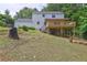 Backyard showing a deck overlooking a grassy lawn at 1492 Harbins Rd, Norcross, GA 30093