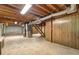 A partial basement with stairs and exposed utilities at 1492 Harbins Rd, Norcross, GA 30093