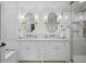 Elegant bathroom with double vanity, marble countertops, and glass enclosed shower at 3251 Pinestream Nw Rd, Atlanta, GA 30327