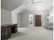 Open bedroom with desk, carpeted floors and a view to an ensuite bathroom at 3251 Pinestream Nw Rd, Atlanta, GA 30327