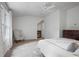 Spacious bedroom with neutral carpet, large window, and vintage dresser at 3251 Pinestream Nw Rd, Atlanta, GA 30327