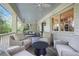 Inviting front porch featuring comfortable seating and a swing at 3251 Pinestream Nw Rd, Atlanta, GA 30327
