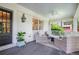 Welcoming front porch with comfortable seating and stylish decor at 3251 Pinestream Nw Rd, Atlanta, GA 30327
