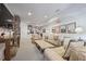 Finished basement with shiplap walls, carpet and neutral furniture, and a brick column at 3251 Pinestream Nw Rd, Atlanta, GA 30327