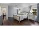 Tranquil main bedroom with hardwood floors, soft lighting, and a serene ambiance at 3251 Pinestream Nw Rd, Atlanta, GA 30327