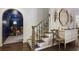 Beautiful staircase with wood railings and stylish decor at 3251 Pinestream Nw Rd, Atlanta, GA 30327