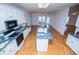 Open kitchen featuring an island, stainless steel appliances, and ample counter space at 111 Dixson Rd, Bowdon, GA 30108