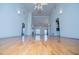 Bright living room showcasing hardwood floors and soaring vaulted ceilings at 111 Dixson Rd, Bowdon, GA 30108