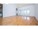 Open floor plan featuring light hardwood floors and bright, natural light at 111 Dixson Rd, Bowdon, GA 30108