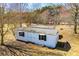 Exterior view of outbuilding with double door and window at 111 Dixson Rd, Bowdon, GA 30108