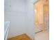 Walk-in closet with shelves, hardwood flooring and bathroom access at 111 Dixson Rd, Bowdon, GA 30108