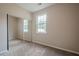 A bright bedroom features a closet with sliding mirrored doors and ample natural light at 331 Windcroft Nw Ln, Acworth, GA 30101