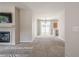 Open-concept living area with a fireplace, access to the backyard through a glass door at 331 Windcroft Nw Ln, Acworth, GA 30101