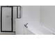 A view of the shower and a soaking tub in a bathroom at 3692 Lambert Ne Ln, Brookhaven, GA 30319