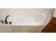 Corner bathtub with dark fixtures at 3692 Lambert Ne Ln, Brookhaven, GA 30319