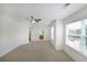 Bright, spacious bedroom with carpet and natural light from large windows at 3692 Lambert Ne Ln, Brookhaven, GA 30319