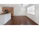Charming breakfast nook with hardwood floors and natural light next to the kitchen at 3692 Lambert Ne Ln, Brookhaven, GA 30319