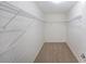 An empty walk-in closet with wire shelving at 3692 Lambert Ne Ln, Brookhaven, GA 30319