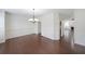 Open dining room with hardwood floors, modern lighting, and detailed trim, perfect for entertaining at 3692 Lambert Ne Ln, Brookhaven, GA 30319