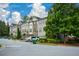 Exterior view of newly renovated townhomes and landscaped front yards at 3692 Lambert Ne Ln, Brookhaven, GA 30319