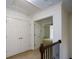 Upstairs hallway featuring closet space, an open doorway, and carpeted flooring at 3692 Lambert Ne Ln, Brookhaven, GA 30319