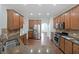 Well-appointed kitchen featuring granite countertops, stainless steel appliances, and wood cabinets at 3692 Lambert Ne Ln, Brookhaven, GA 30319