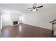 Spacious living room featuring a fireplace, hardwood floors, and natural light at 3692 Lambert Ne Ln, Brookhaven, GA 30319