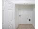An empty room with tile floor and white walls at 3692 Lambert Ne Ln, Brookhaven, GA 30319