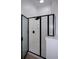 Modern shower with black trim and light colored shower insert at 3692 Lambert Ne Ln, Brookhaven, GA 30319