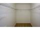 An empty walk-in closet is furnished with white, adjustable wire shelving, providing organized storage in a home at 3692 Lambert Ne Ln, Brookhaven, GA 30319