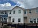 New townhomes with multiple exterior designs and large, bright windows at 5108 Arista Dr, Douglasville, GA 30135