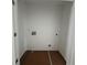 Empty laundry room with hookups ready to go, offering a blank canvas for your laundry needs at 5108 Arista Dr, Douglasville, GA 30135