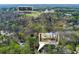 Aerial view of Cherokee Town & Country Club surrounded by wooded areas at 9995 Huntcliff Trce, Atlanta, GA 30350